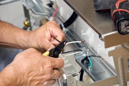 PTI Electric, Plumbing, & HVAC repairing electric wires in Galloway, OH.